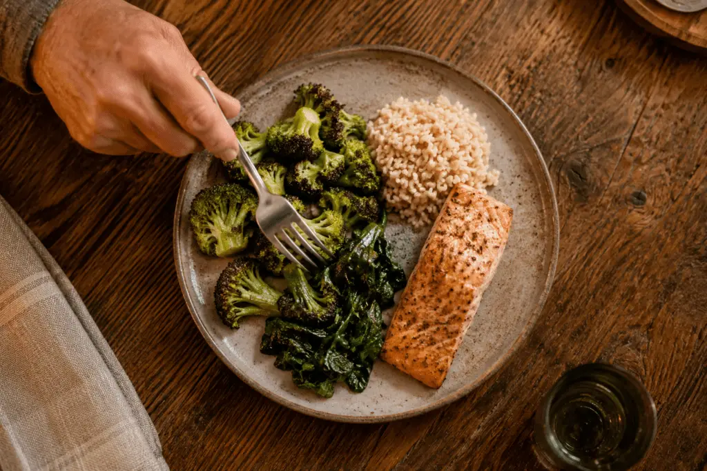Older man preparing low-glycemic vegetables and lentils to reduce HbA1c naturally
